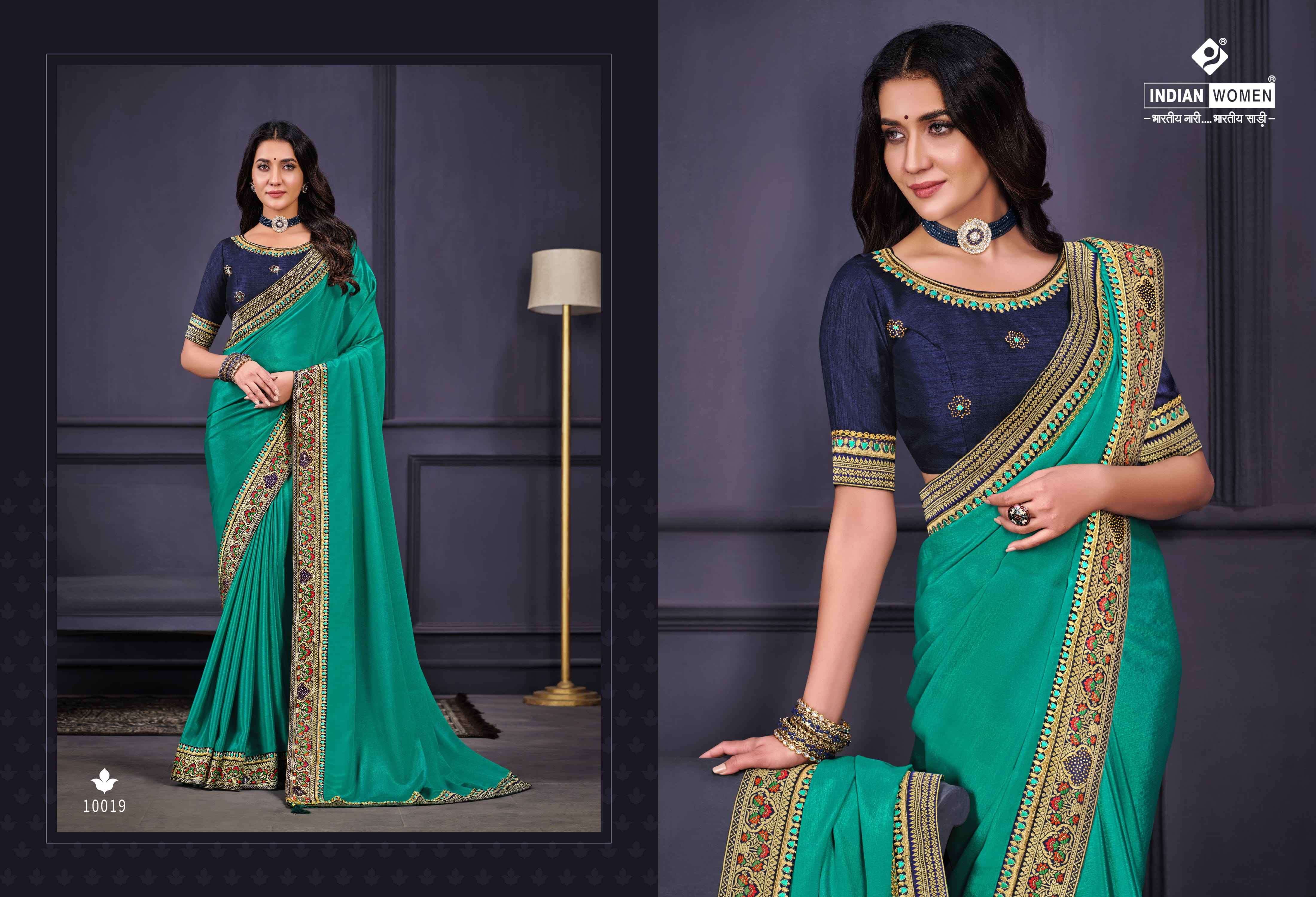 NEW ORANGE BY INDIAN WOMEN 10017 TO 10022 SERIES INDIAN TRADITIONAL WEAR COLLECTION BEAUTIFUL STYLISH FANCY COLORFUL PARTY WEAR & OCCASIONAL WEAR FANCY SAREES AT WHOLESALE PRICE